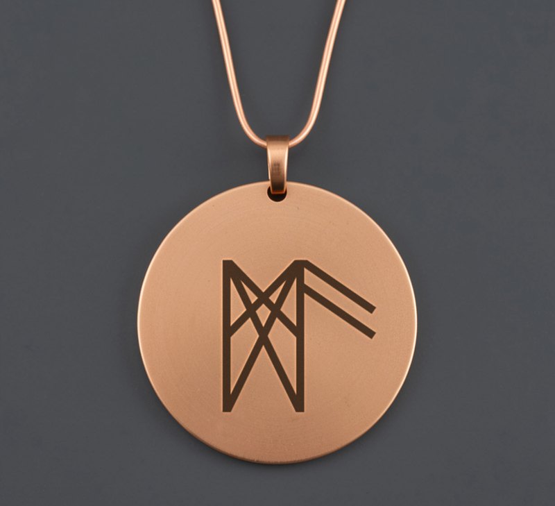 Médaillon de cuivre ciré gravé de la bindrune